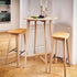 Nordic bar stool with solid oak frame and Luna Carbon leather seat with powder-coated steel footrest