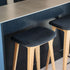 Nordic Bar Stool in oak with Luna Carbon leather seat and powder-coated steel footrest