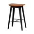 Nordic bar stool in black stained oak with Terra Safari leather upholstery and powder-coated steel footrest, 73 cm tall.