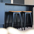 Nordic bar stool in black stained oak with Terra Black leather upholstery and detailed stitching