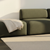 Cosmo Olive Fjord Sofa pouf with rounded edges and soft lines in a calm Scandinavian style.