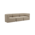 Beige three seater Fjord sofa by sackit with soft rounded lines and deep cushioned seats shown against a black background