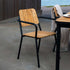 Kirra Patio Chair with powder-coated aluminum frame and teak wood seat and backrest in outdoor setting