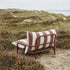 Mollis Lounge Chair in Renesse Chestnut with powder-coated aluminum frame and eco-certified textile upholstery outdoors