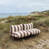 Mollis Lounge Sofa 2 Seater in Renesse Chestnut with powder-coated aluminum frame and eco-certified textile cushions outdoors