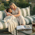Mollis Lounge Sofa 2 Seater in Renesse Olive with powder-coated aluminum frame and clean lines for outdoor use