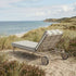 Mollis Sunbed in Renesse Taupe with adjustable backrest and powder-coated aluminum frame outdoors