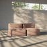Brown two seater indoor sofa with soft rounded cushions in a sunlit modern room showcasing the frameless comfort of sackit furniture