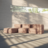 Soft indoor three seater sofa with lounger in warm taupe upholstery by sackit in a minimalist room with sunlight and soft shadows across the floor
