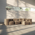 sackit indoor four seater corner sofa in warm taupe fabric with soft rounded cushions and a flexible frameless design in a sunlit modern room