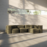 Olive green four seater corner sofa with deep cushions and rounded modular sections in a sunlit minimalist room by sackit