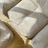 Soft Sofa Indoor lounger in olive green corduroy fabric with soft, flexible design.