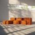 Soft Sofa Indoor lounger in orange jacquard fabric with soft, modular design and low profile.