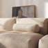 Soft Sofa Indoor bolster cushion in Teddy Beige fabric with cylindrical shape on a light background.