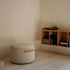 Round SACKit Pouf Indoor in Teddy Brown fabric with a soft, textured surface and compact shape