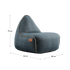 Canvas Lounge Chair and pouf in petrol canvas fabric with a soft, rounded shape and backrest.