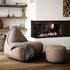 Canvas Lounge Chair and pouf in canvas petrol fabric with a soft, rounded shape and backrest.