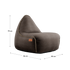 Canvas Lounge Chair and pouf in petrol canvas fabric with a relaxed, durable design.