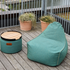 Cobana Lounge Chair and Pouf in Cobana Grey with soft fabric and rounded shape.