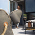 Cobana Lounge Chair and Pouf in grey olefin fabric with hand-sewn stitches, indoor and outdoor use.