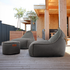 Cobana Lounge Chair and Pouf in grey olefin fabric with a rounded shape and soft texture.