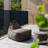 Cobana Lounge Chair and Pouf in grey olefin fabric with a rounded, cushioned design.
