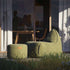 Cobana Lounge Chair and Pouf in Cobana Grey with soft fabric and rounded shapes.