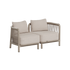 Two seat Kirra outdoor lounge sofa in beige fabric with woven sides and cushions designed by sackit for modern Nordic outdoor spaces