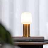Brass Ambience Lamp Intelligent+ with London base, battery-powered outdoor lamp with sleek design.