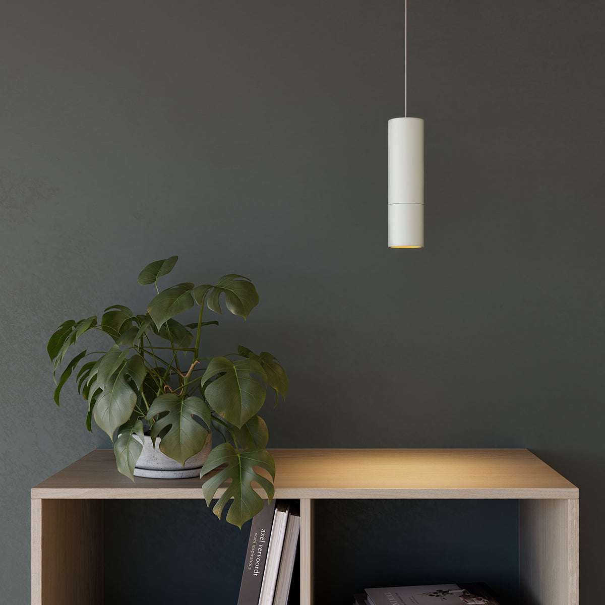 White Expo Pendant light with slim aluminum design hanging indoors against a neutral background.