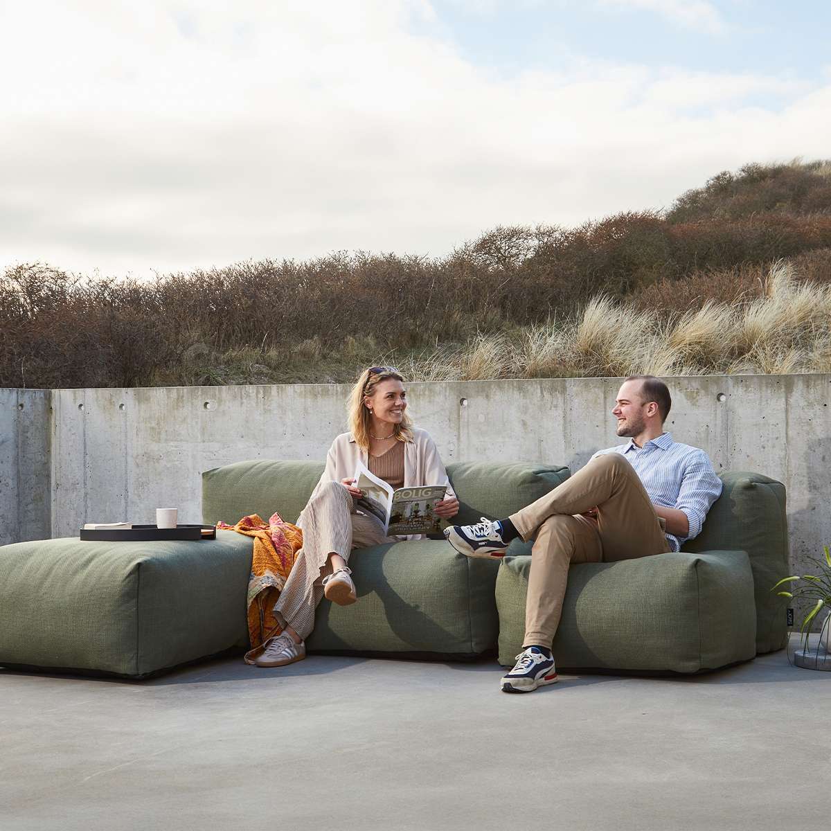 Kirra Olive Soft Sofa Outdoor 3 Seater with Lounger in a garden setting