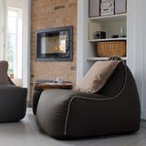 Medley Lounge Chair in Medley Grey fabric with soft, cushioned design and backrest.