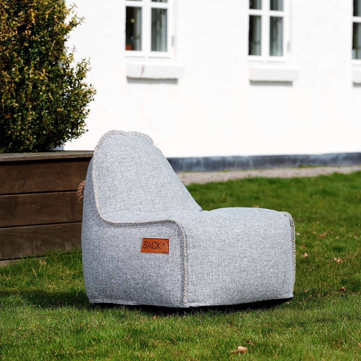 Light grey Cobana Junior Lounge Chair bean bag with soft fabric and rounded shape for kids.
