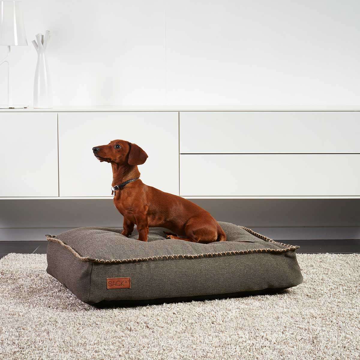 Medium Cobana Brown dog bed with water-repellent fabric and non-slip bottom on a white background