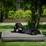 Large Cobana Brown dog bed with water-repellent fabric and non-slip bottom in a home setting