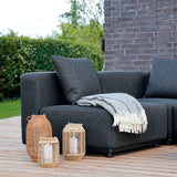 Cobana Lounge Sofa seat module in black powder-coated aluminum frame with dark fabric cushion outdoors