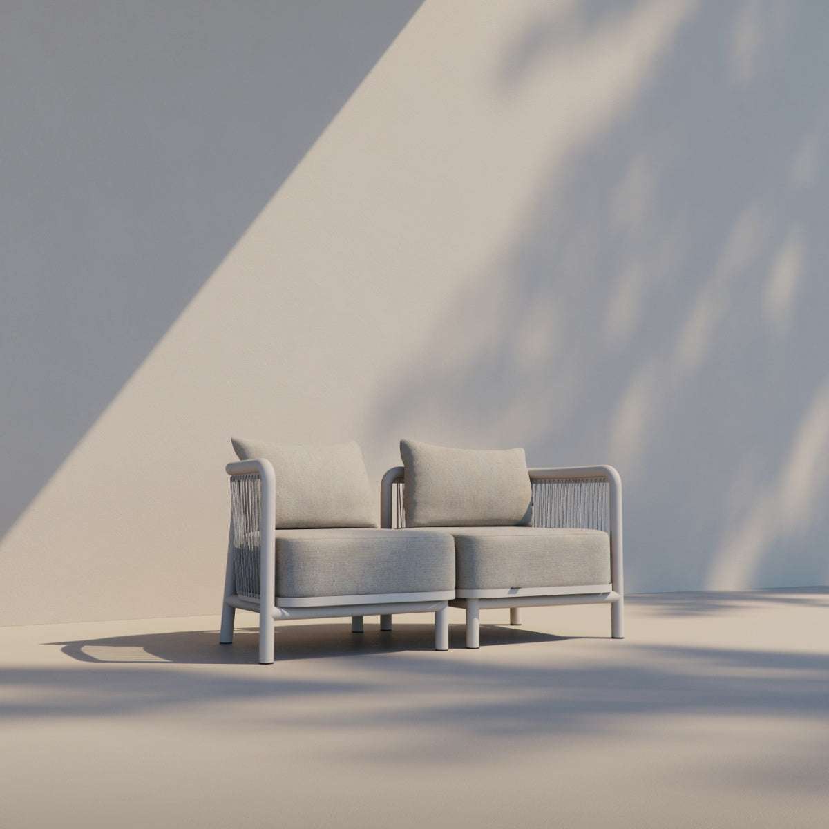 Kirra Lounge Sofa corner module in Kirra Sand with powder-coated aluminum frame and Olefin textile cushions outdoors.