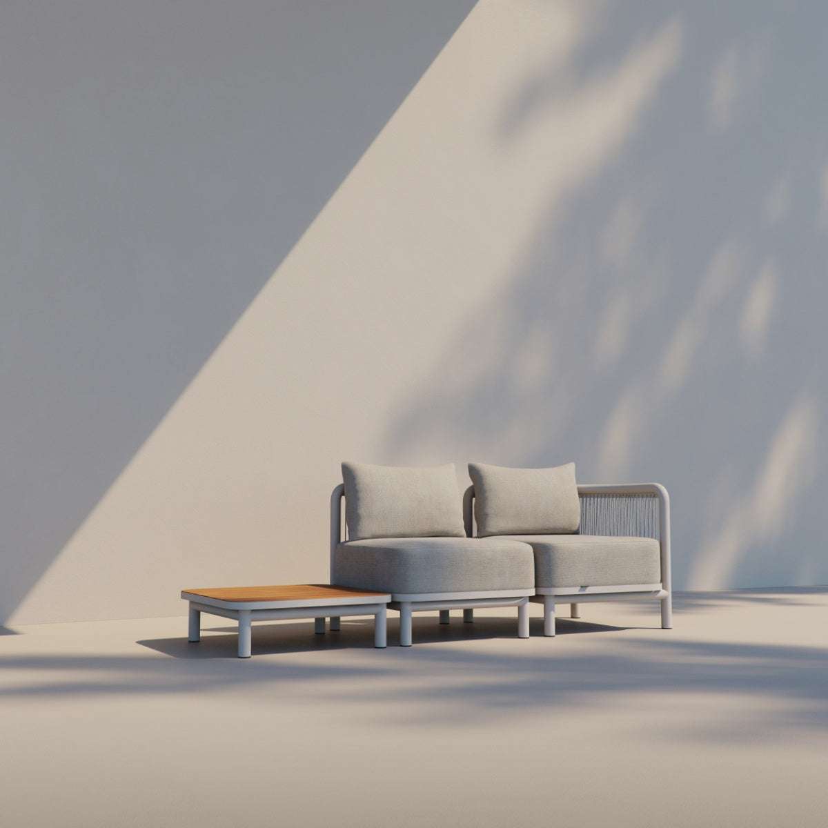 Taupe Kirra Side Table with teak wood top and powder-coated aluminum frame, outdoor setting.