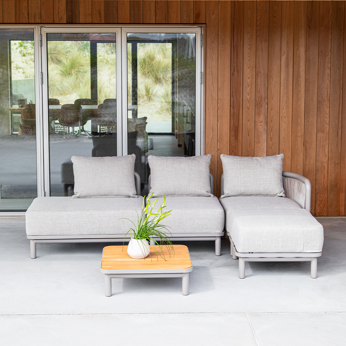 Kirra Lounge Sofa pouf in sand color with aluminum frame and olefin textile for outdoor use