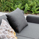 Black Cobana Cushion with water-repellent Olefin fabric for outdoor sofa seating.