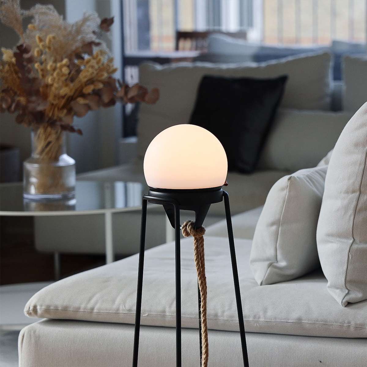 Black powder-coated stainless steel Patio Accessory Stand with a simple, minimalist design.