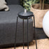 Black powder-coated stainless steel Patio Accessory Stand with simple, sturdy design for outdoor use.