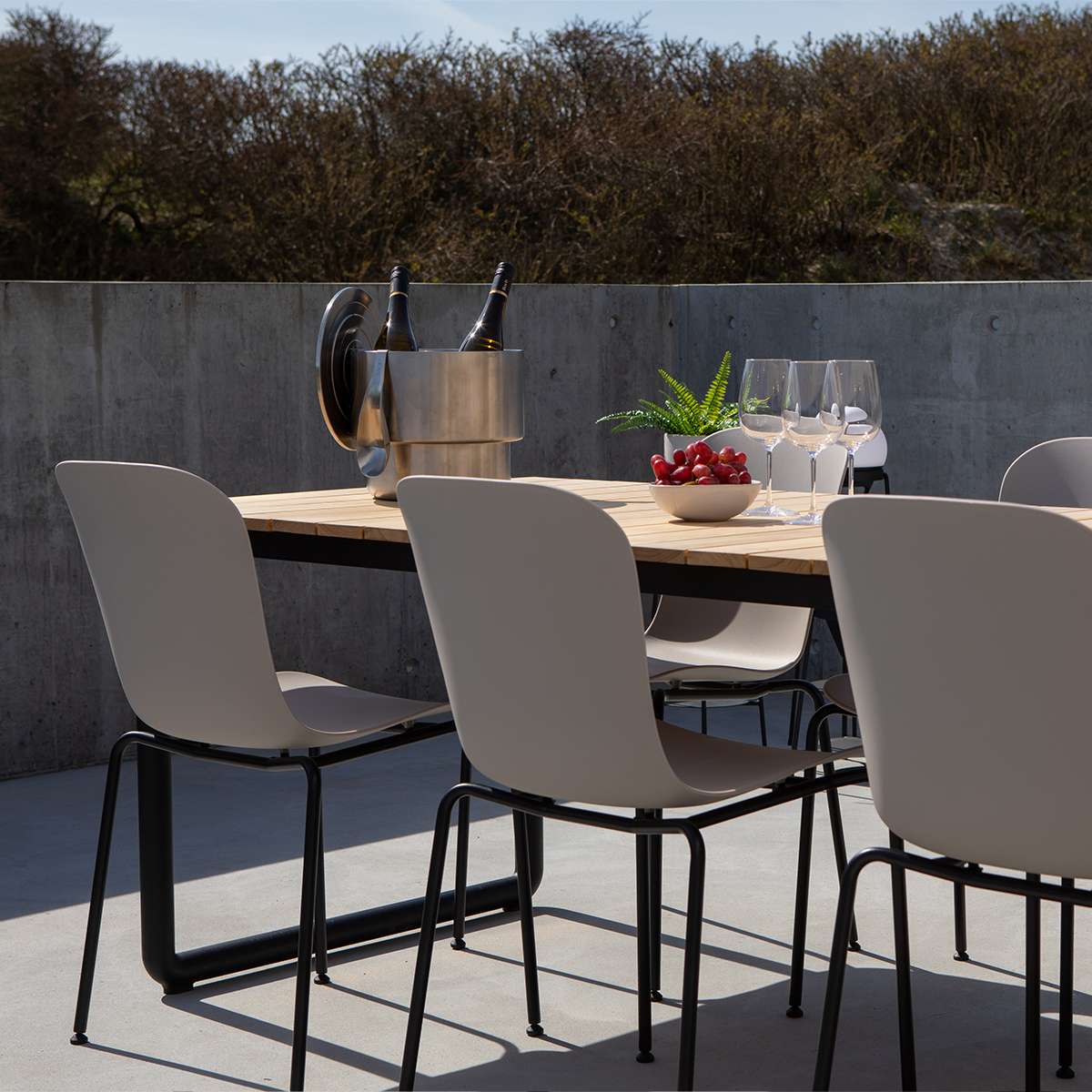 Taupe Patio Chair no. One with black powder-coated steel frame for outdoor use