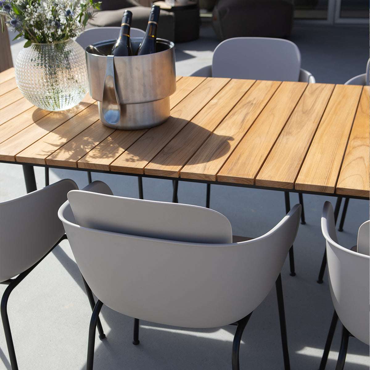 Patio Chair no. One S2 in taupe recycled plastic with black powder-coated steel frame outdoors