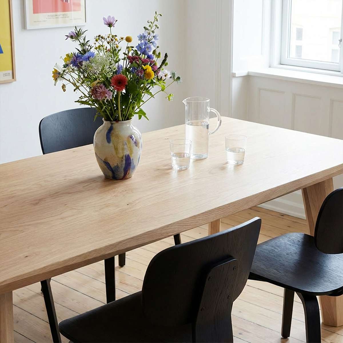 Edge Dining Table made of FSC-certified European oak with faceted edges and matte lacquered surface