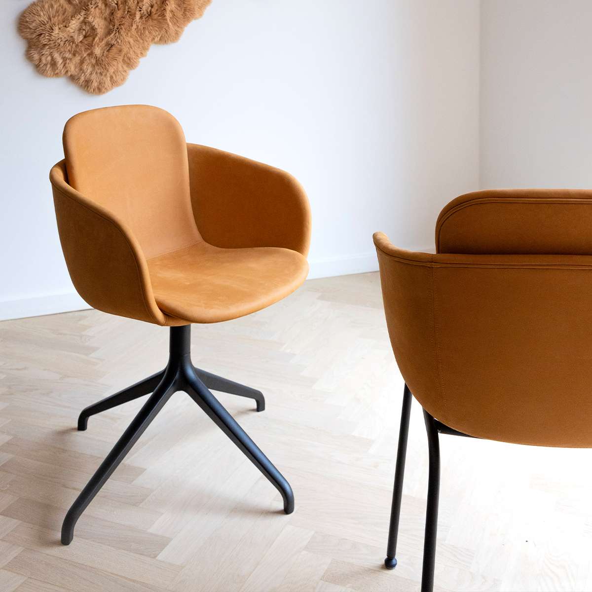 Terra Safari Chair no. One S2 dining chair with black swivel base and leather upholstery