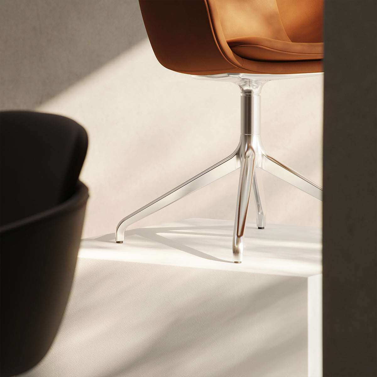 Terra Black Chair no. One S2 with polished swivel base in indoor dining setting