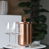 Outdoor accessory stand with wine cooler in stainless steel with simple geometric design