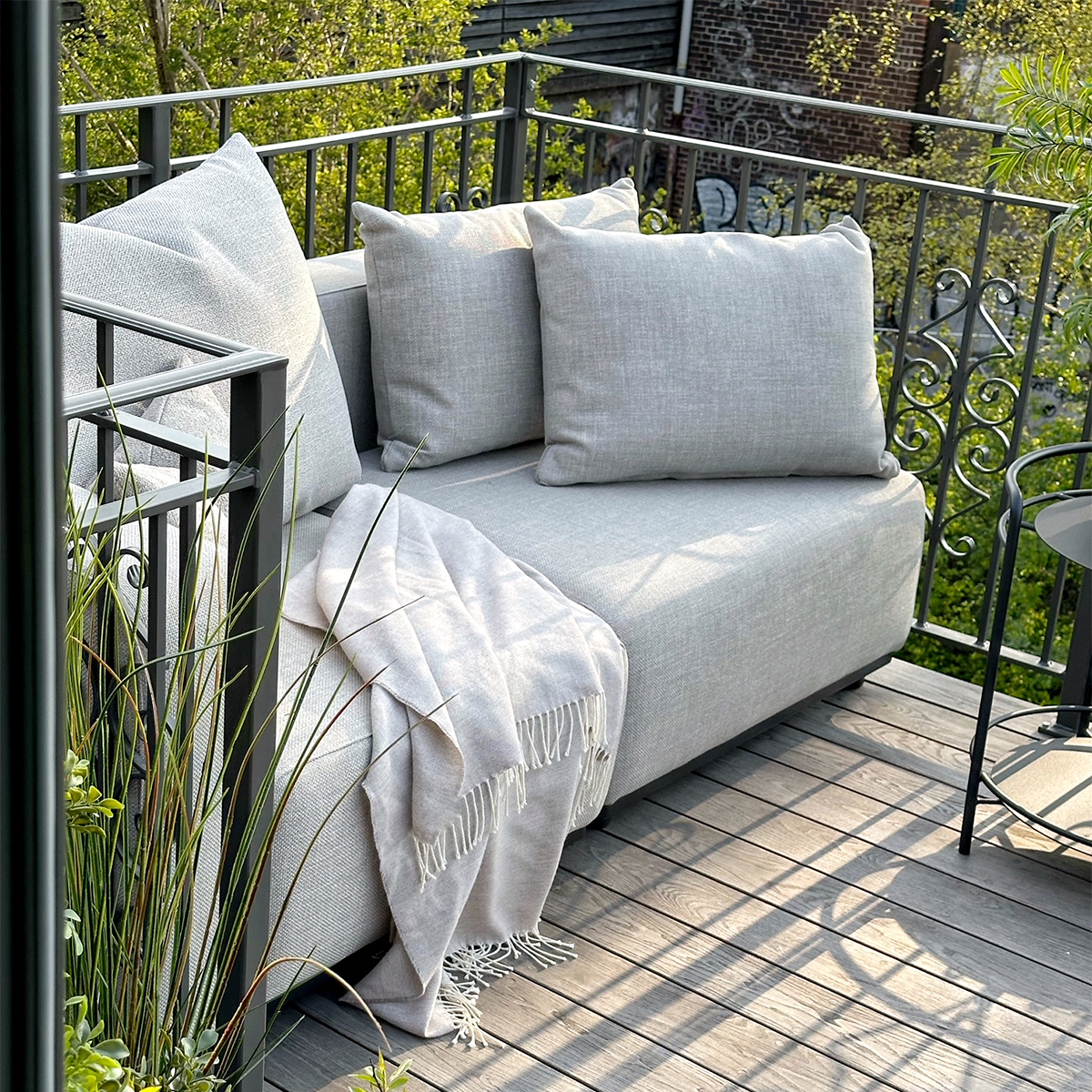 Kirra Sand Cobana Lounge Sofa 2-seater with powder-coated aluminum frame and cushions