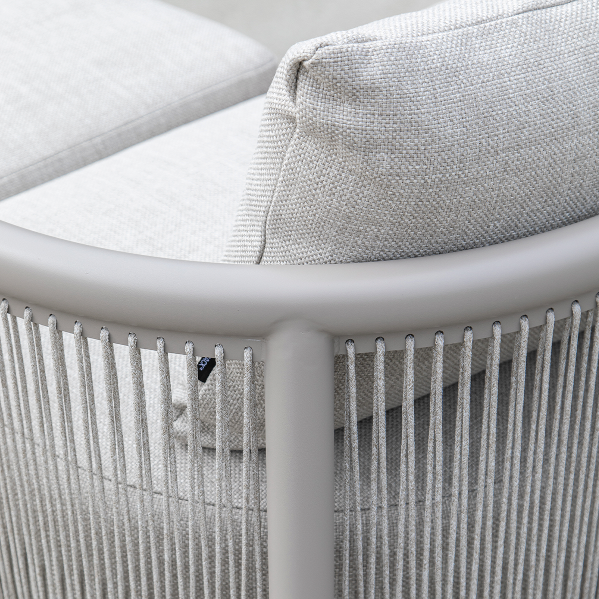 Kirra Lounge Sofa corner module in sand color with powder-coated aluminum frame and olefin fabric upholstery.